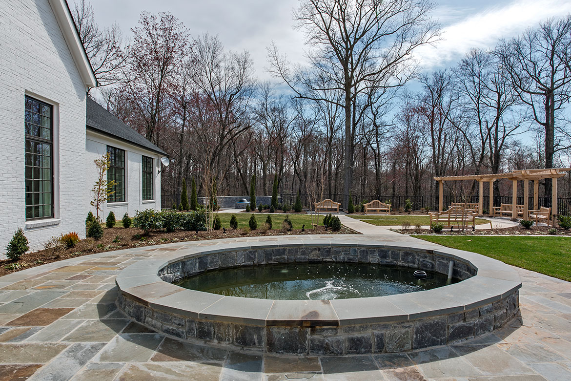 Crest of Alexandria Clubhouse Exterior Koi Pond